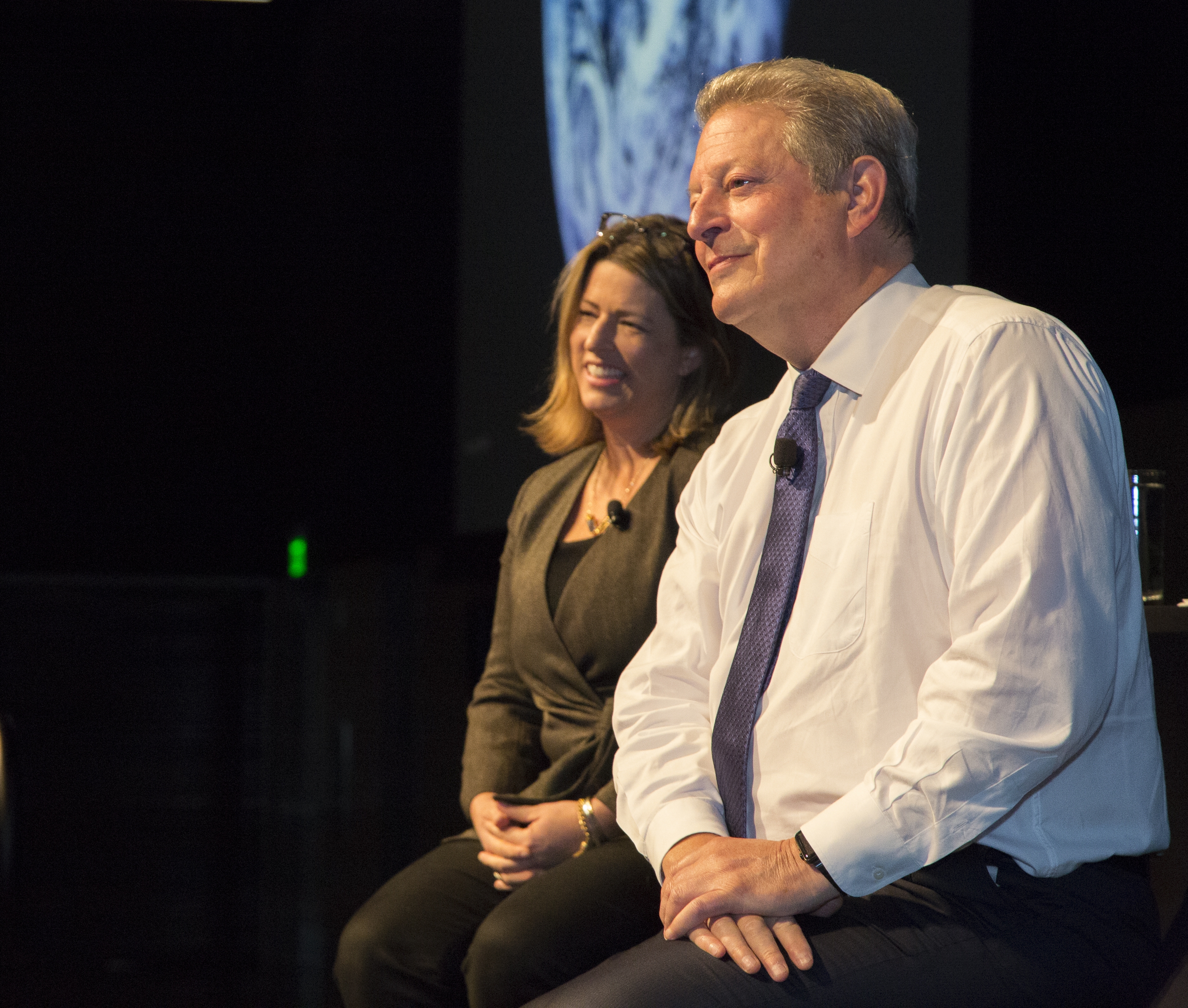 Amazon Director of Sustainability Kara Hurst (L) and Vice President Al Gore on stage at Amazon