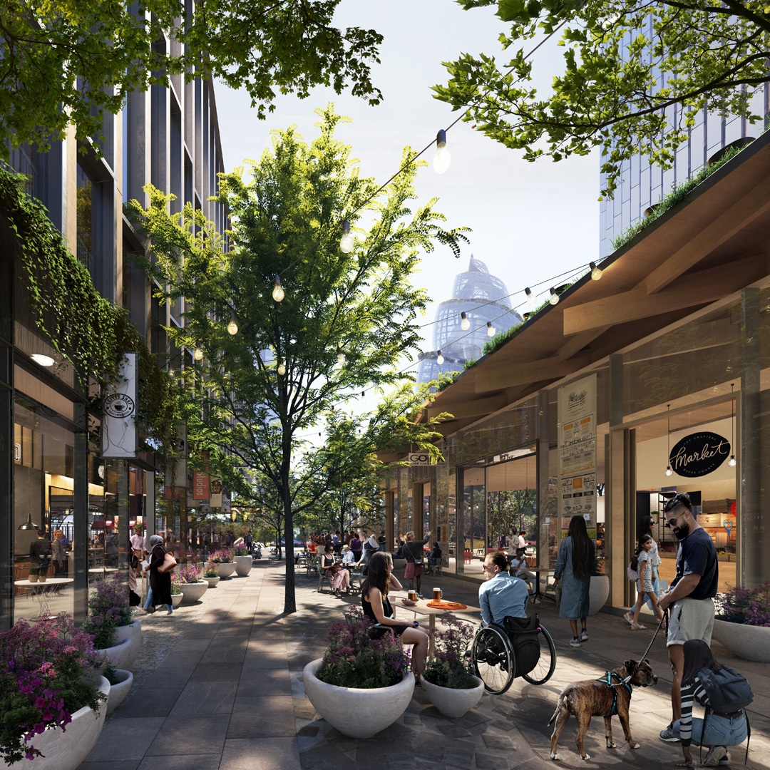 A rendering of the new Amazon headquarters in Arlington. The rendering shows people dining and shopping in a retail space at the  headquarters.