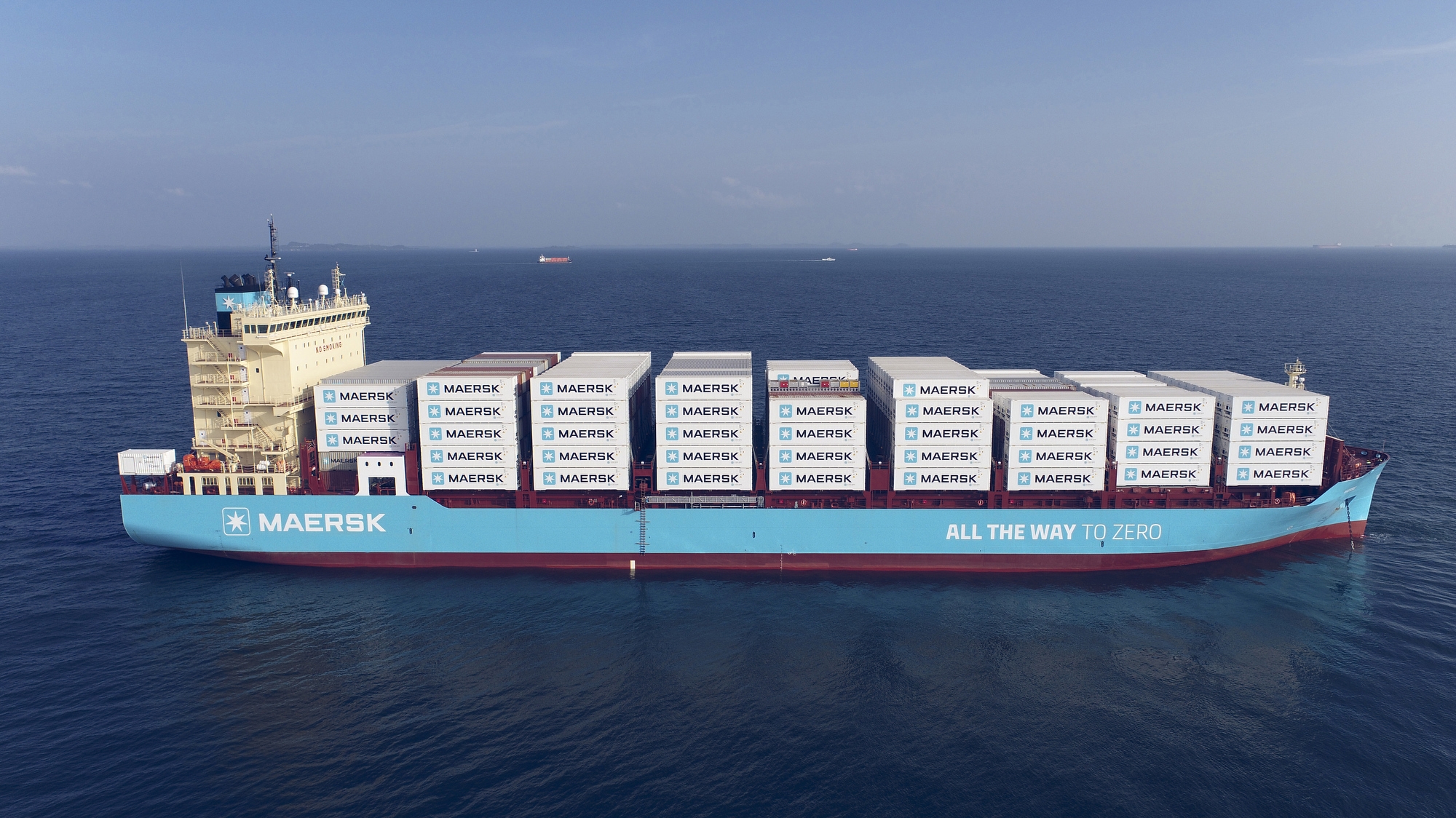 An image of an Amazon Maersk feeder vessel in the water.