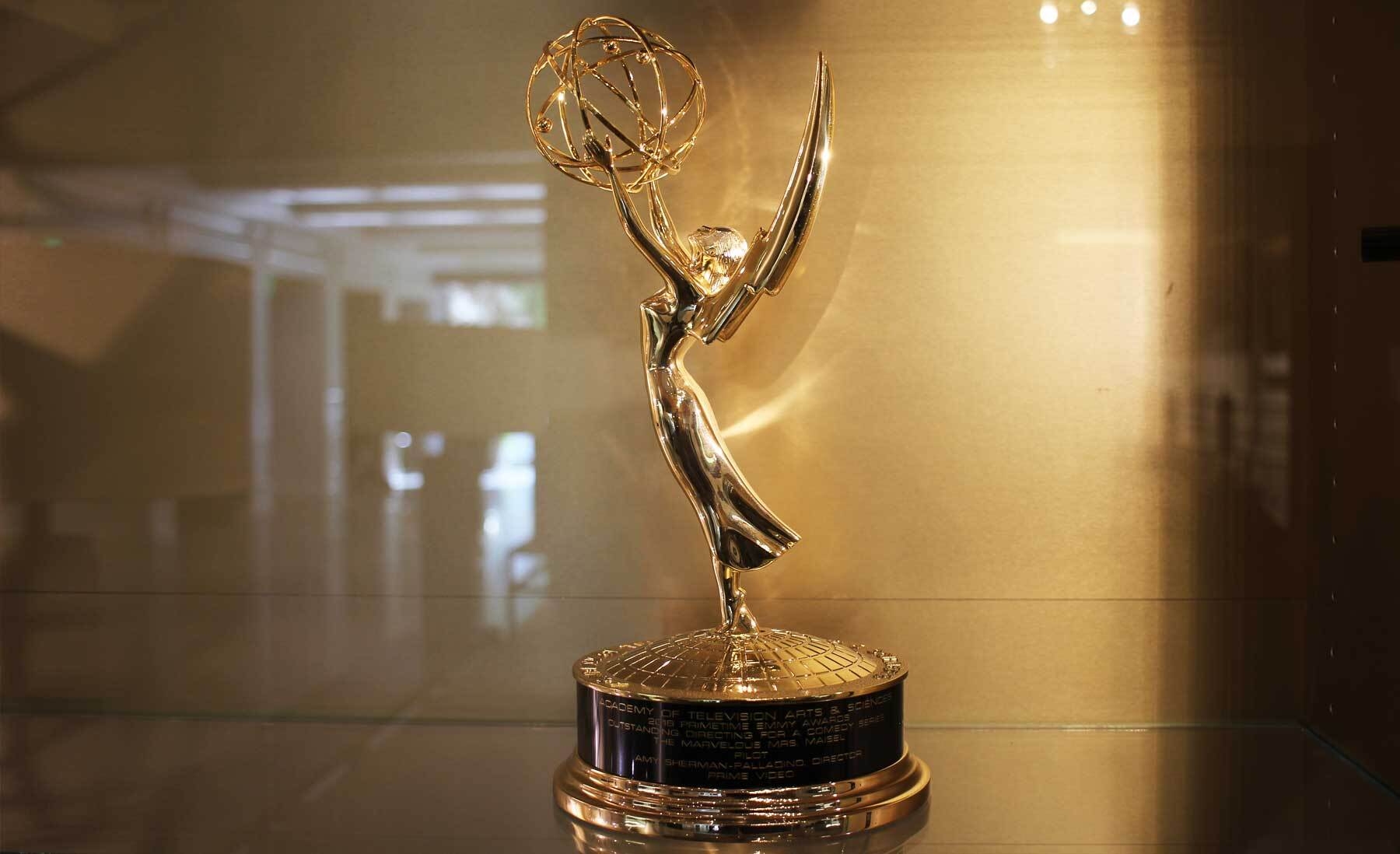 An image of an Emmy Award in a case 