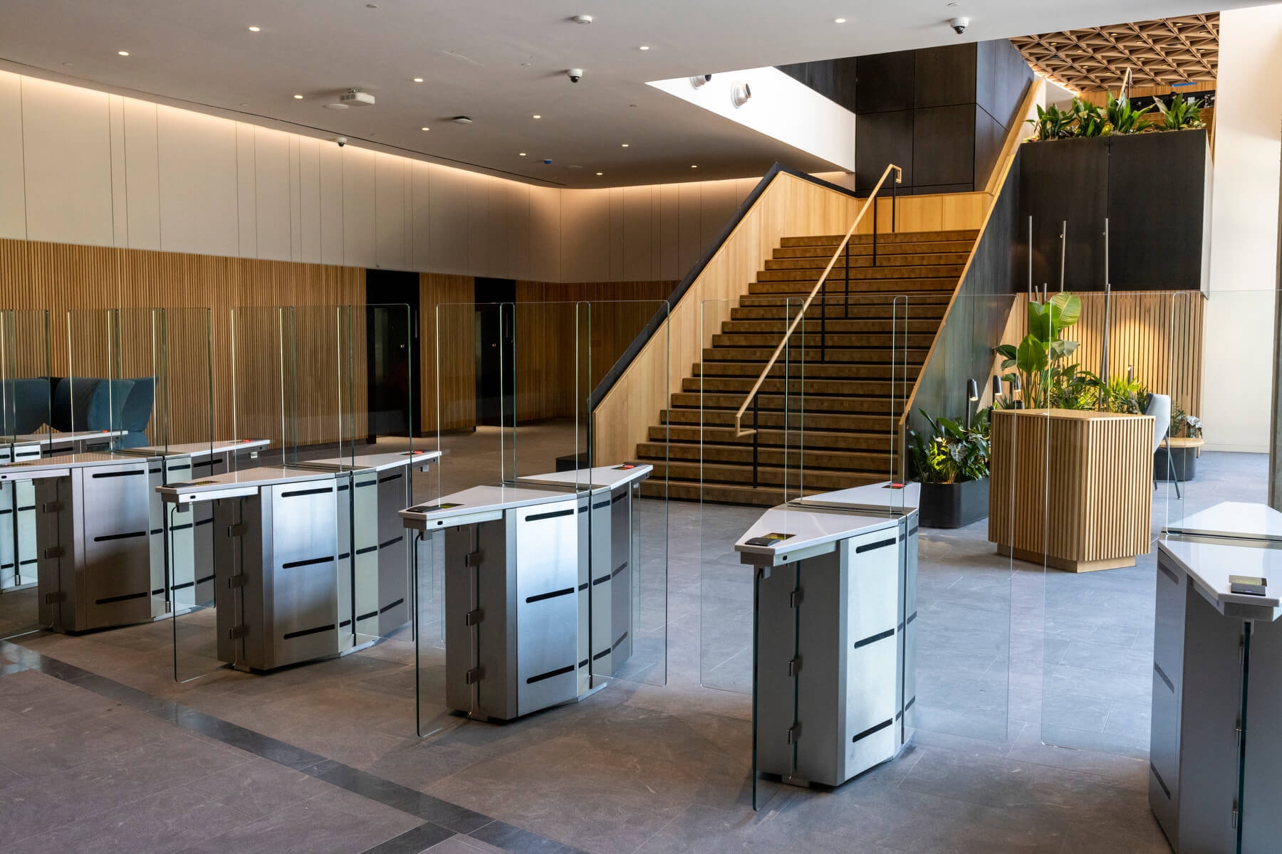 An image of turnstiles in the front lobby of Amazon's second headquarters 
