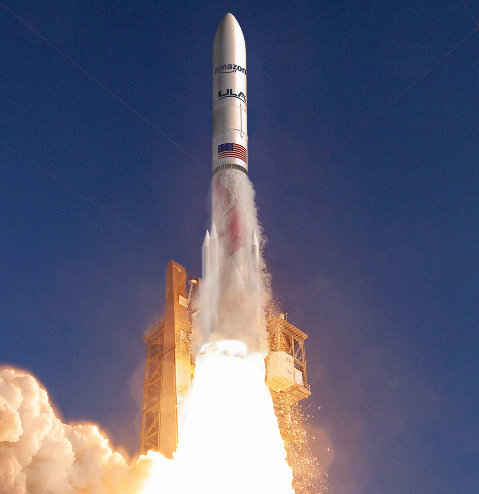 An image of a rocket launch. The rocket has Amazon's logo on it and a flag of the United States. 